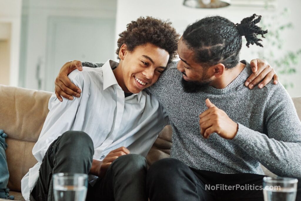 Teenage son talking with his father